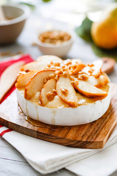 Caramelized Pear and Walnut Topped Brie with Honey
